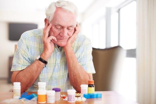 man with medications